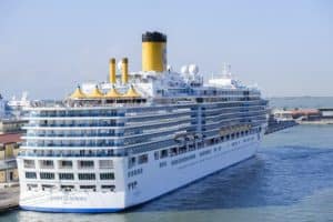 Cruise ship docked at Cozumel Mexico port, cruise vacation, Caribbean travel, Stingray Villa vacation rental nearby.