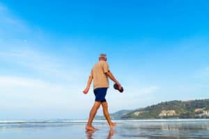 Relaxing stroll along Cozumel Mexico beach near Stingray Villa vacation rental with scenic ocean views
