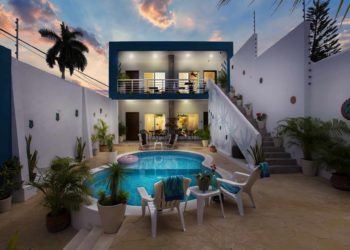Stylish Vacation Rental at Stingray Villa in Cozumel with a private pool, lush tropical plants, and modern décor, perfect for relaxing stays in Mexico.