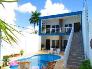 Luxurious vacation rental at Stingray Villa in Cozumel Mexico, featuring a private pool, tropical decor, and scenic ocean views, perfect for a relaxing getaway.