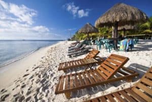 Sunset Beach Chairs and Tiki Huts