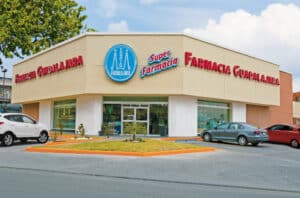 Farmacia Guadalajara location in Cozumel Mexico, a popular pharmacy for travelers and locals, with a parking lot and accessible entrance, near Stingray Villa vacation rental.