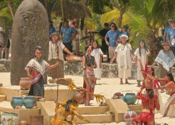 Vibrant traditional Mayan dance performance on the beaches of Cozumel, Mexico near Stingray Villa vacation rental, showcasing local culture and colorful costumes.