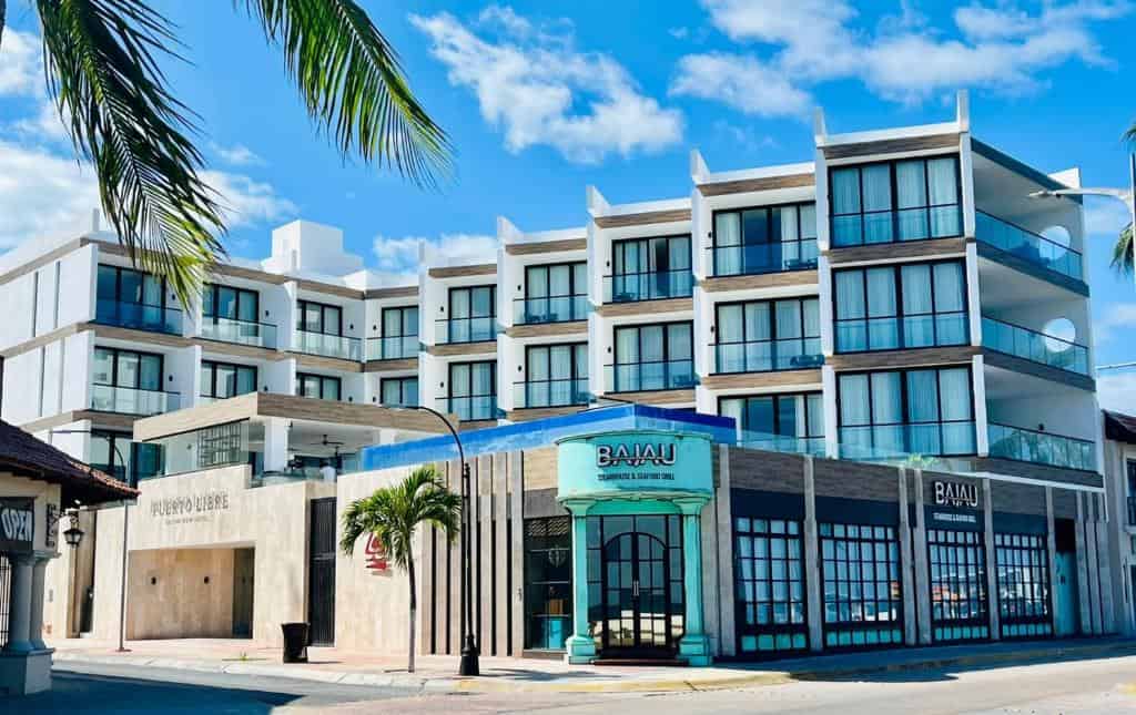 Modern luxury beachfront vacation rental in Cozumel Mexico, Hotel Puerto Libre features ocean-view balconies, contemporary design, and proximity to local attractions. Perfect for a tropical getaway.