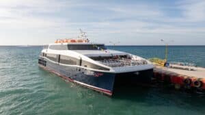 Luxury catamaran ferry docked at the pier in Cozumel.